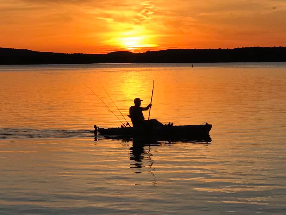 Person fishing on the lake