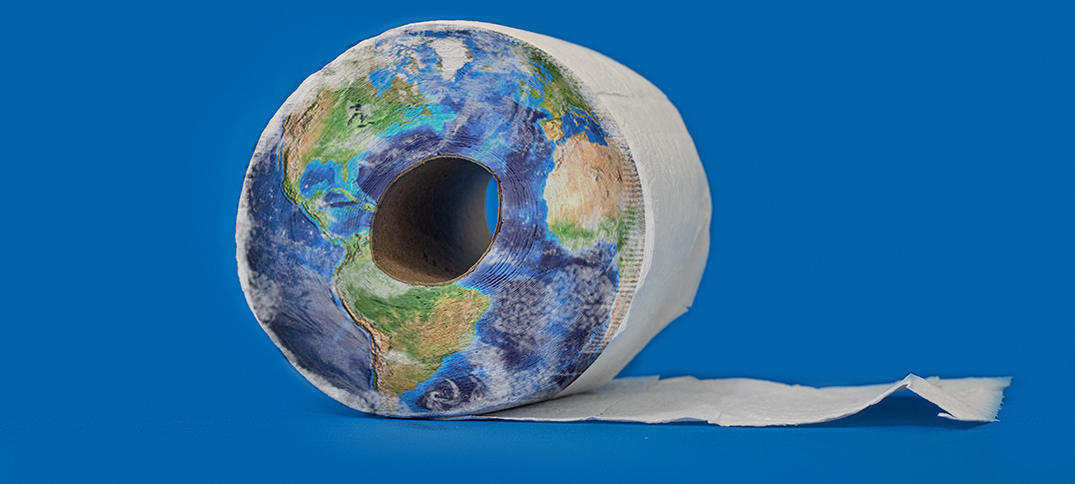 The side view of a toilet roll painted to look like the world