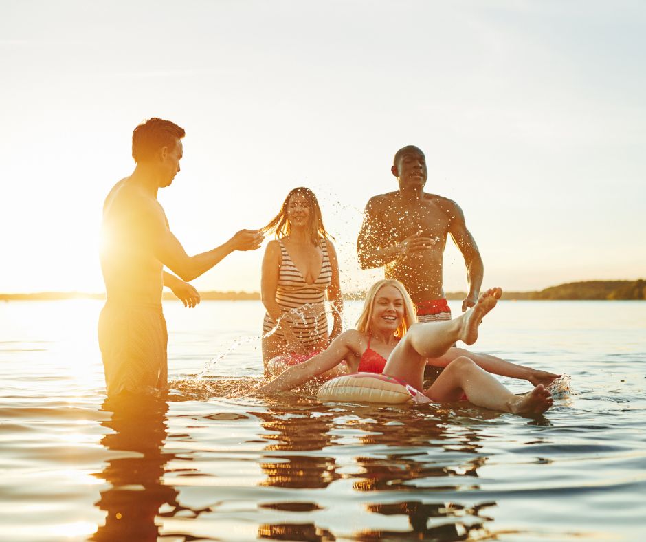 People swimming in a lake.