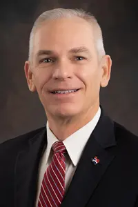 Portrait of Director Weldon