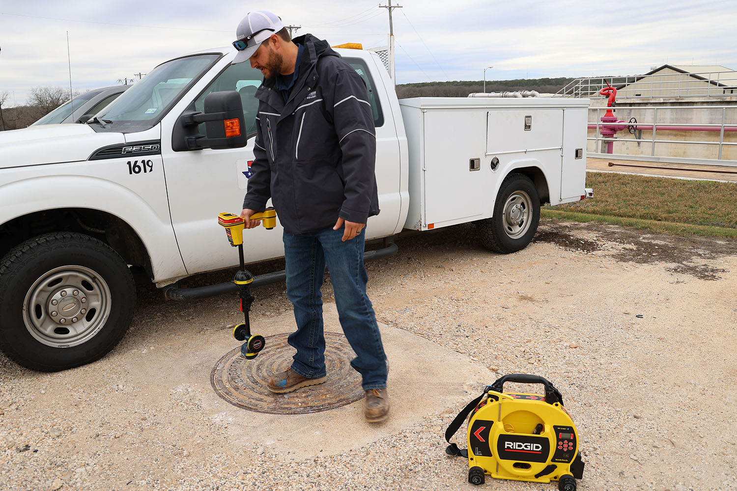 Photo of Colton Adkins working in the field